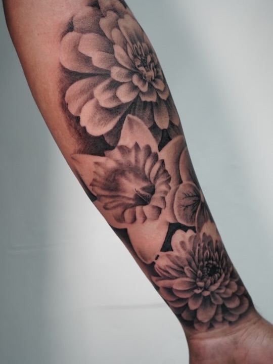 Floral tattoo artwork by Charleigh Rae at Broadway Dept. Midtown Sacramento
