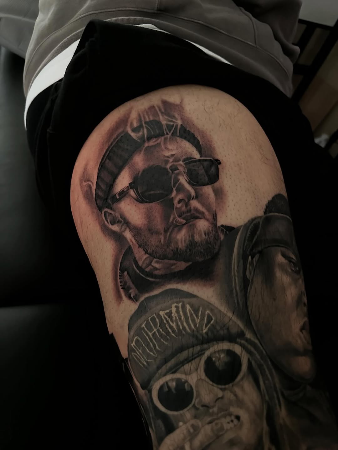 Completed Mac Miller portrait tattoo on leg sleeve by Mauricio Contreras at Broadway Dept. Sacramento