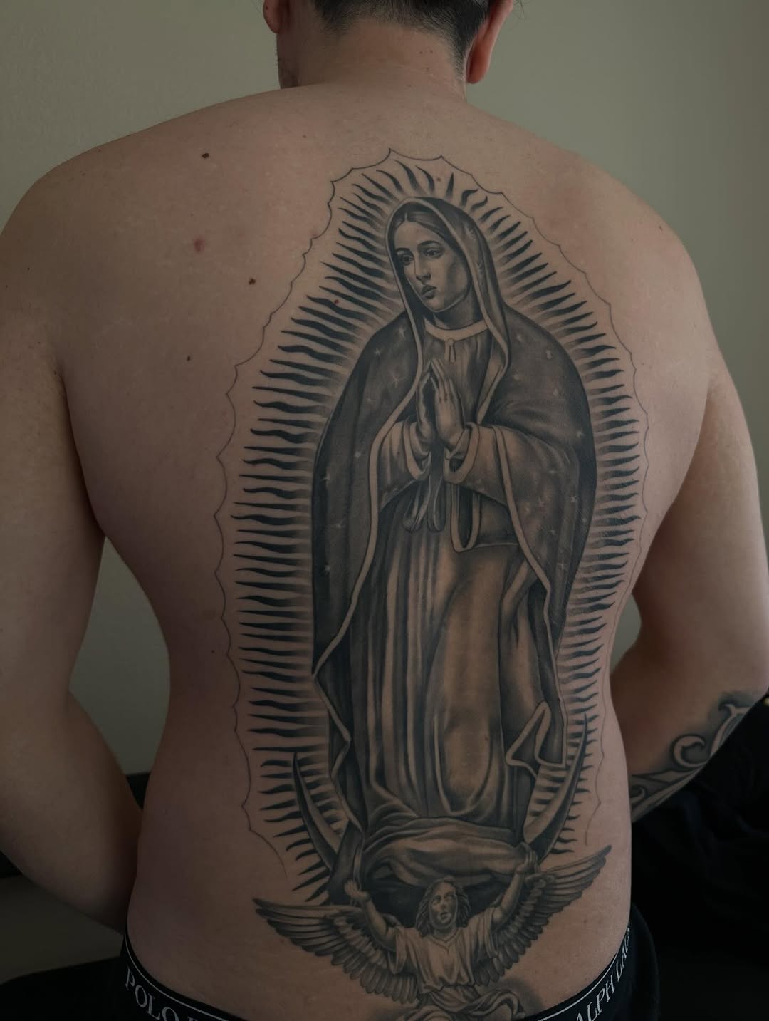 Completed large scale La Virgencita tattoo design by Mauricio Contreras at Broadway Dept Midtown Sacramento