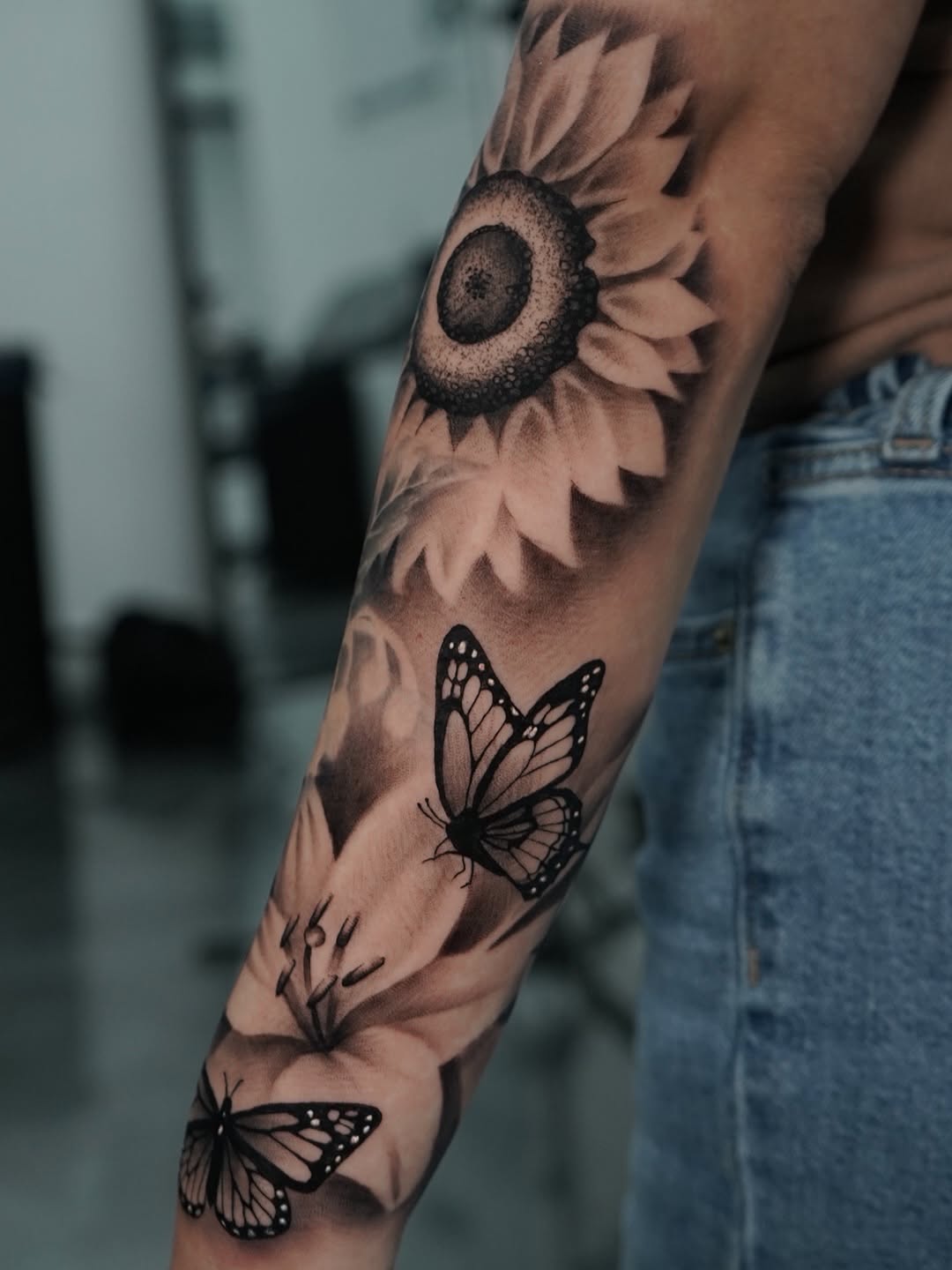 Close-up of feminine butterfly tattoo design by Charleigh Rae at Broadway Dept. Midtown Sacramento