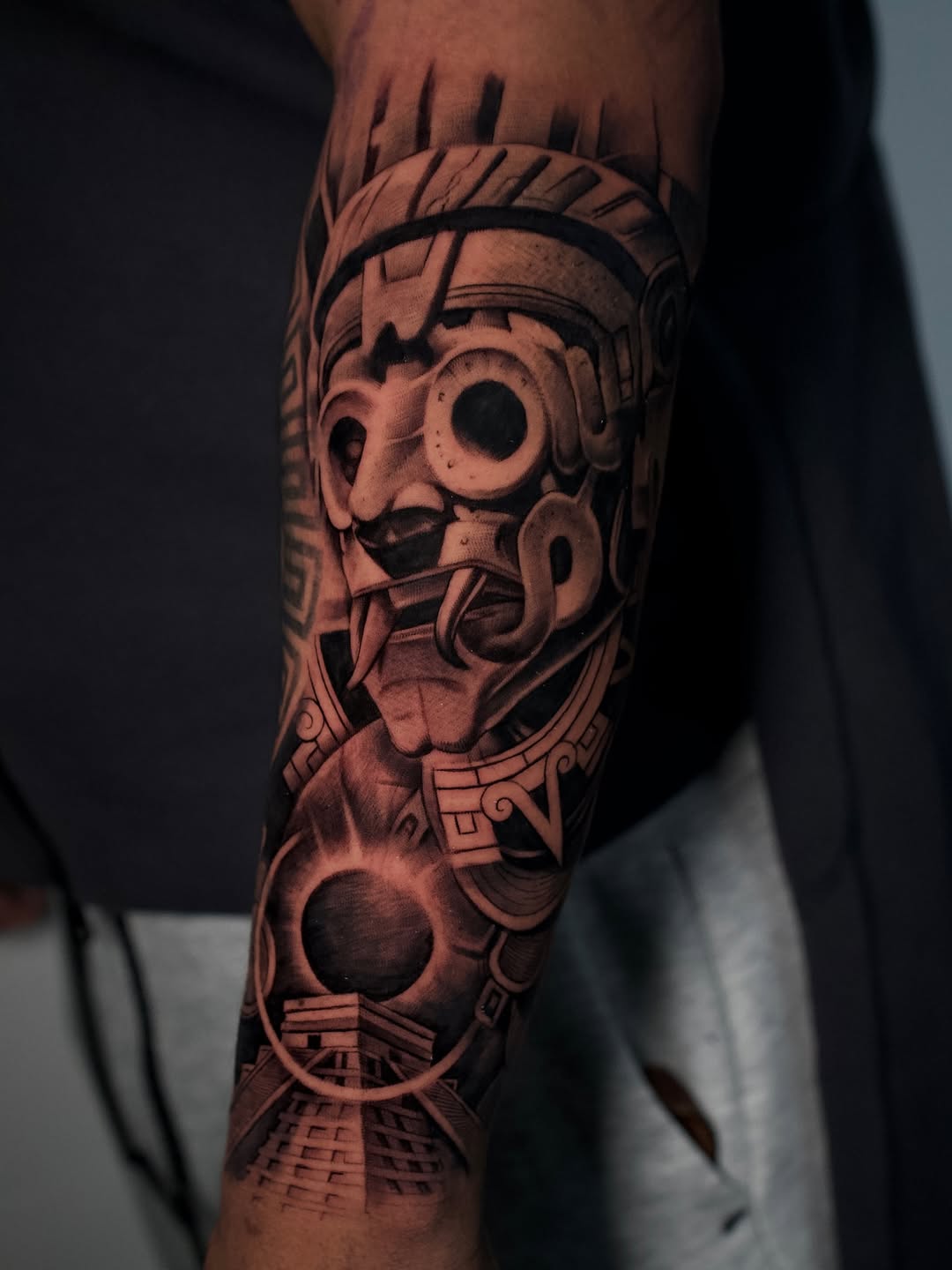 Close-up of Aztec forearm tattoo design by Adrian Idso
