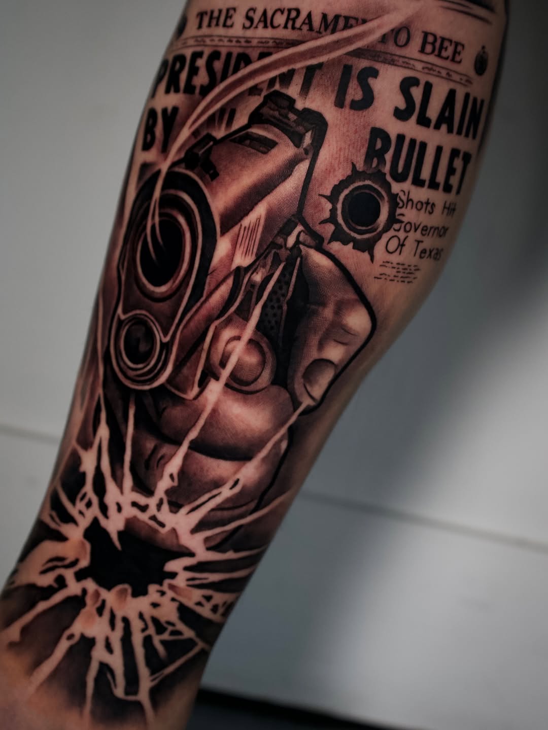 Striking tattoo artwork by Jack Stralen showcasing confident line work at Broadway Dept. Sacramento.