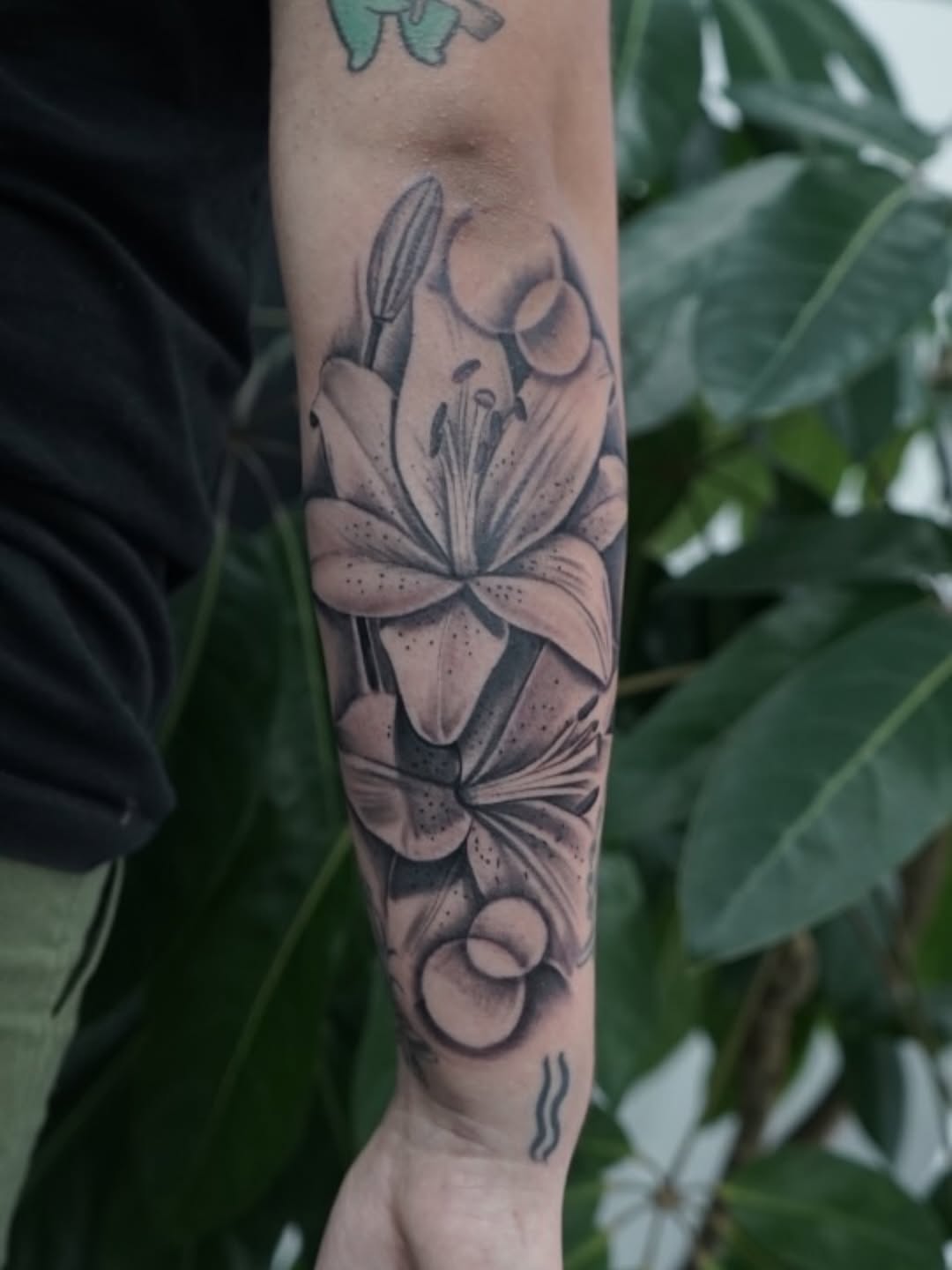 Healed lily tattoo design by Jesus Bernal at Broadway Dept. Midtown Sacramento