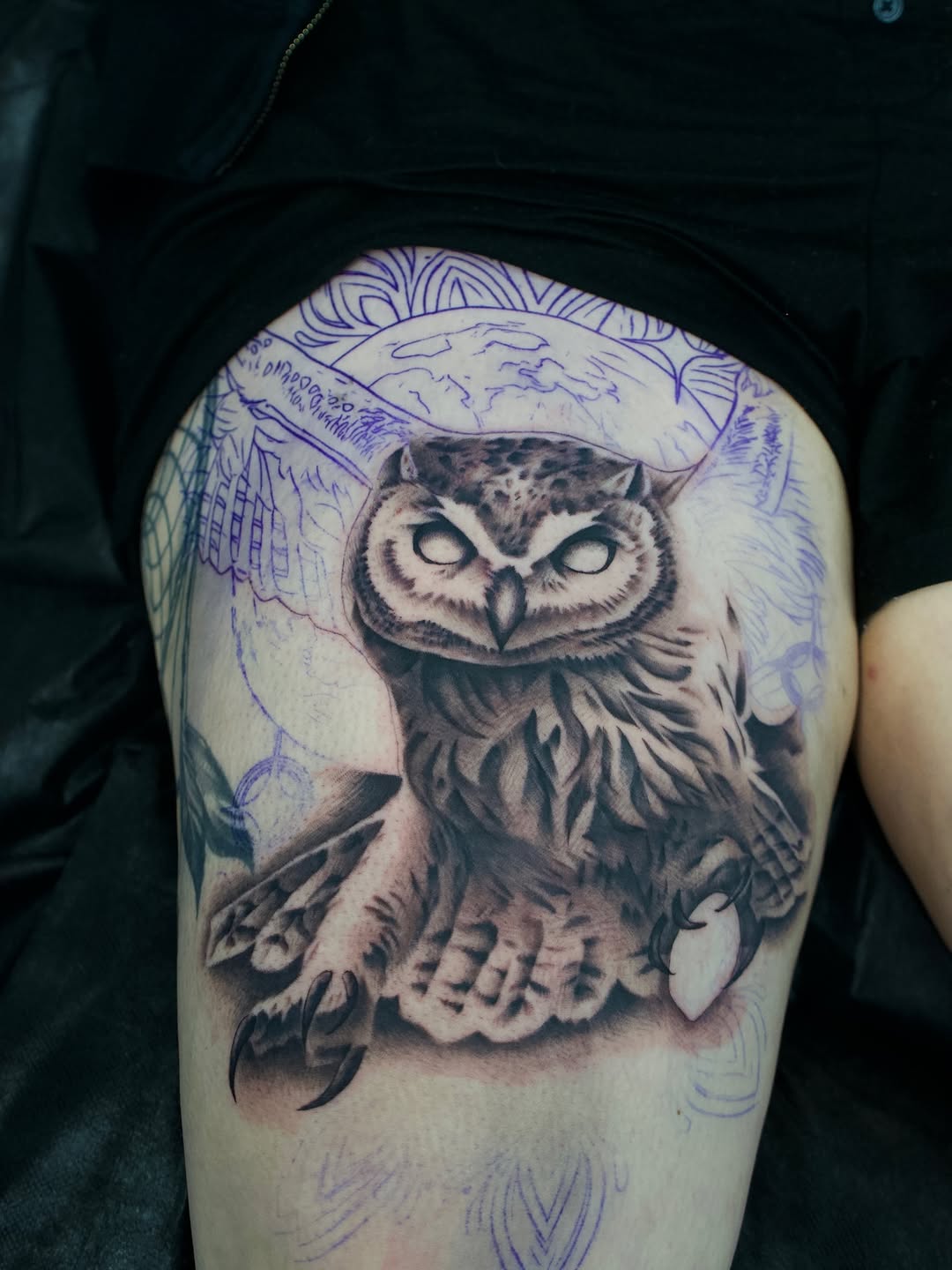 Close-up detail of realistic owl tattoo by Charleigh Rae at Broadway Dept. Sacramento, demonstrating intricate realism technique