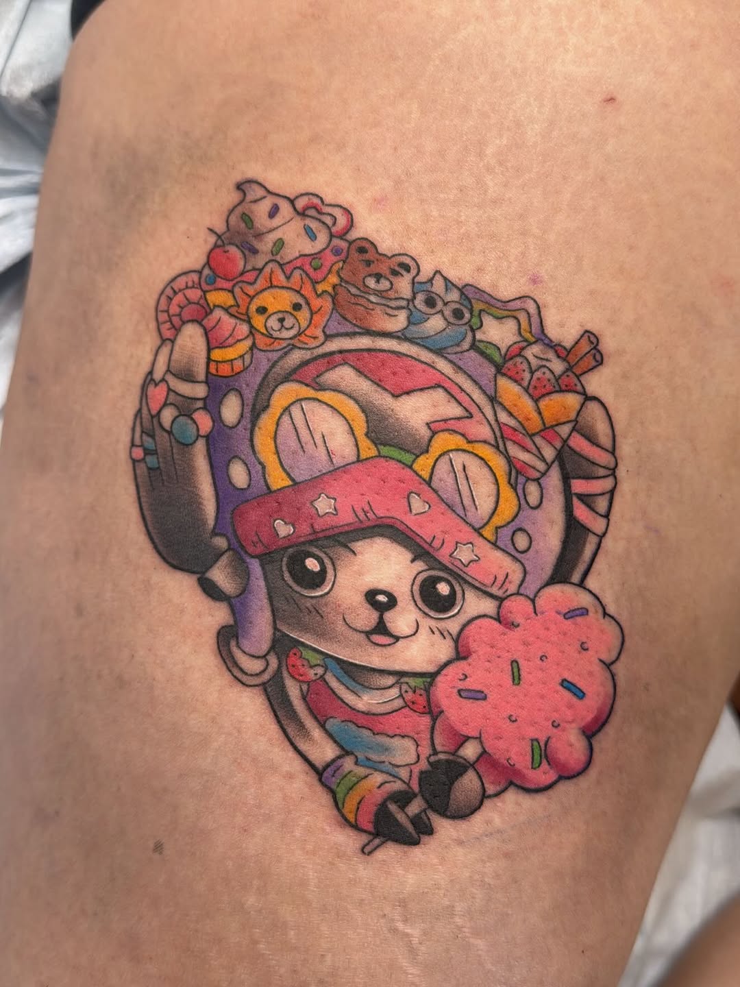 Cute little tattoo featuring flowers by Crystal Mercedes at Broadway Dept. Sacramento