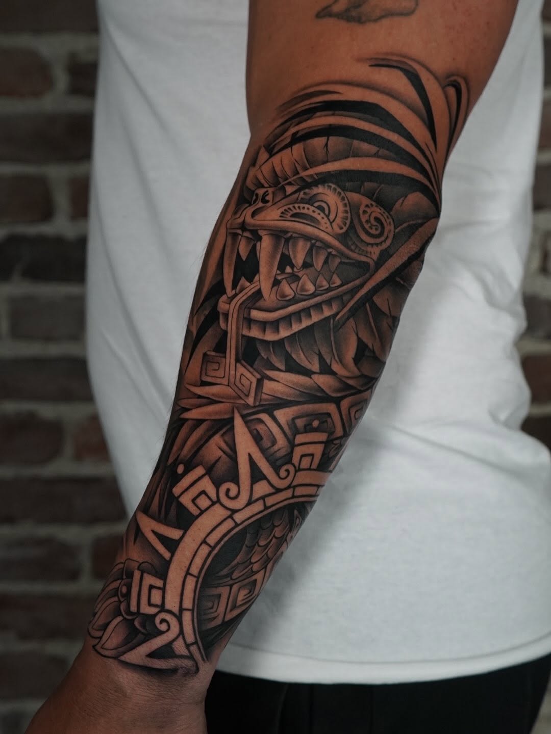 Close-up view of intricate custom tattoo design created at Broadway Dept. Sacramento