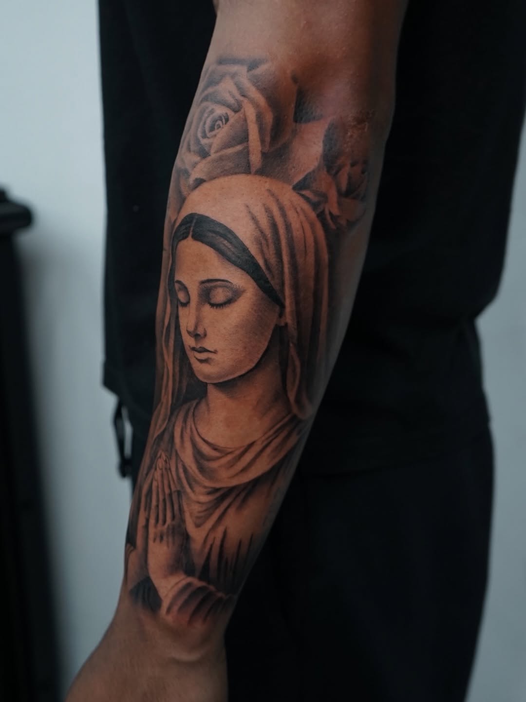 Virgin Mary realism tattoo showing fine detail work