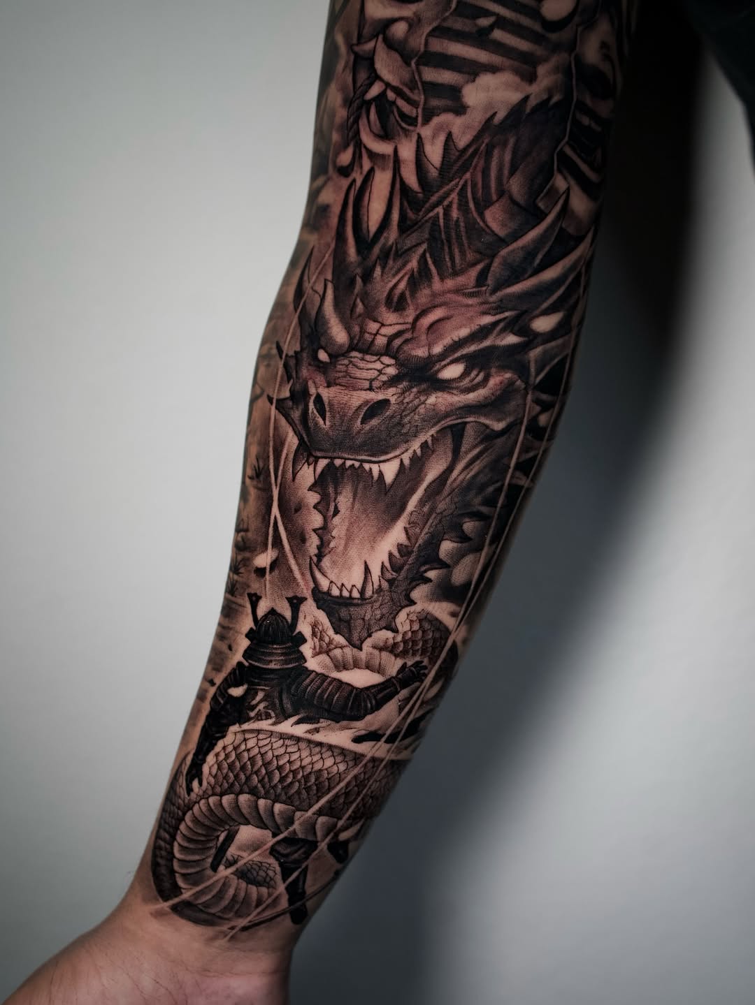 Second session of three-day arm sleeve tattoo work at Broadway Dept. Sacramento