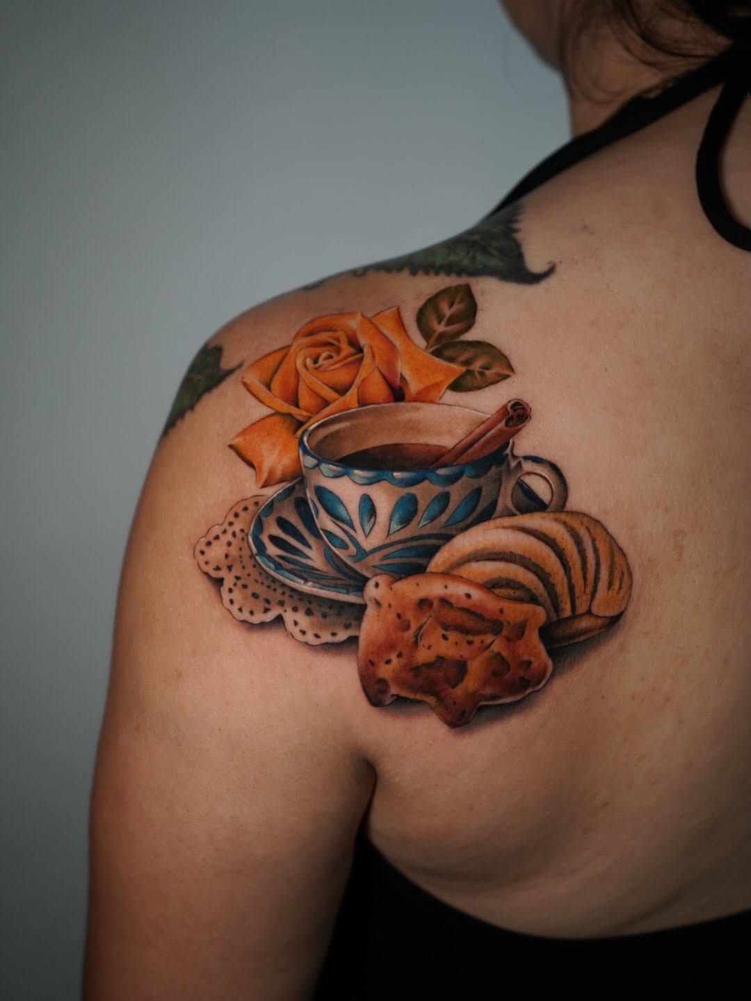 Close-up detail of pan dulce tattoo artwork captured at Broadway Dept. Midtown Sacramento