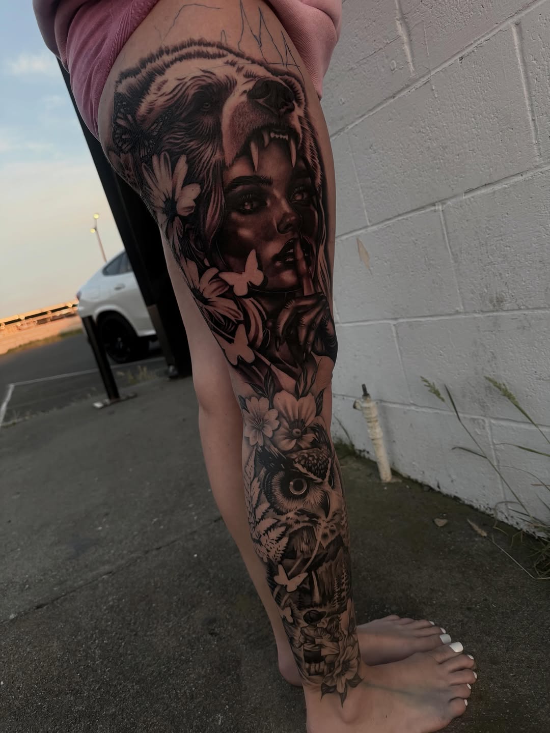 Healed version of the same black and grey tattoo by Bella Gomez at Broadway Dept Sacramento demonstrating how tones settle and stabilize after healing