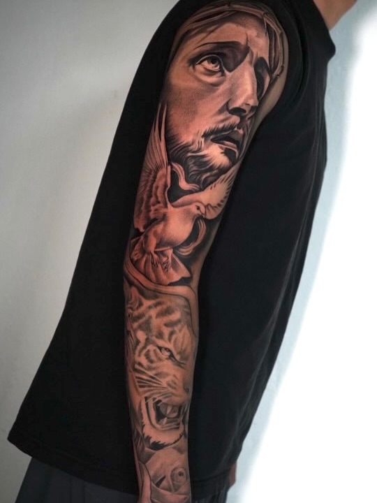 Completed outer sleeve tattoo on client Xavier by Broadway Dept. artist in Midtown Sacramento