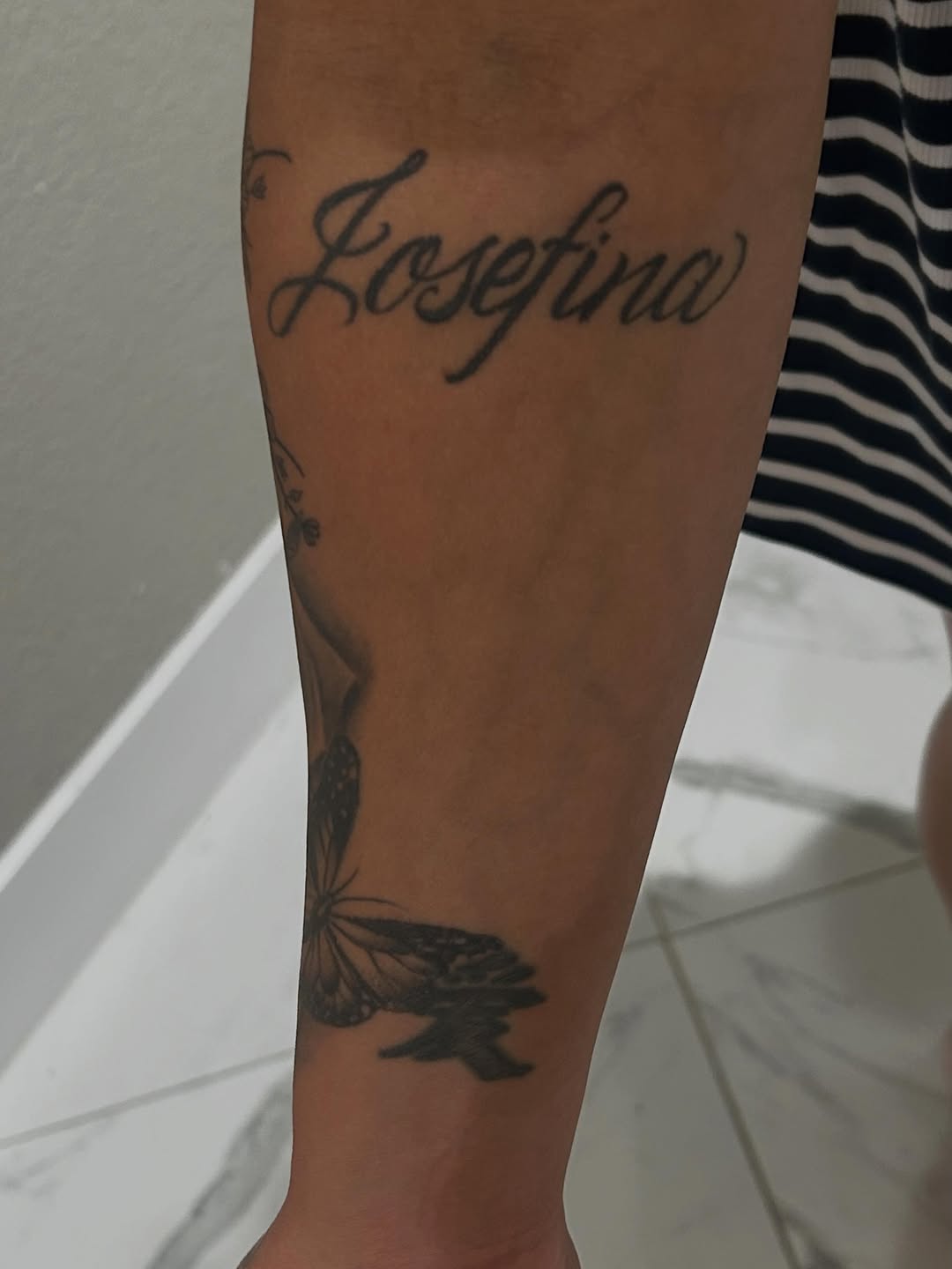 Close-up view of cross coverup tattoo work by Bella Gomez at Broadway Dept. Sacramento