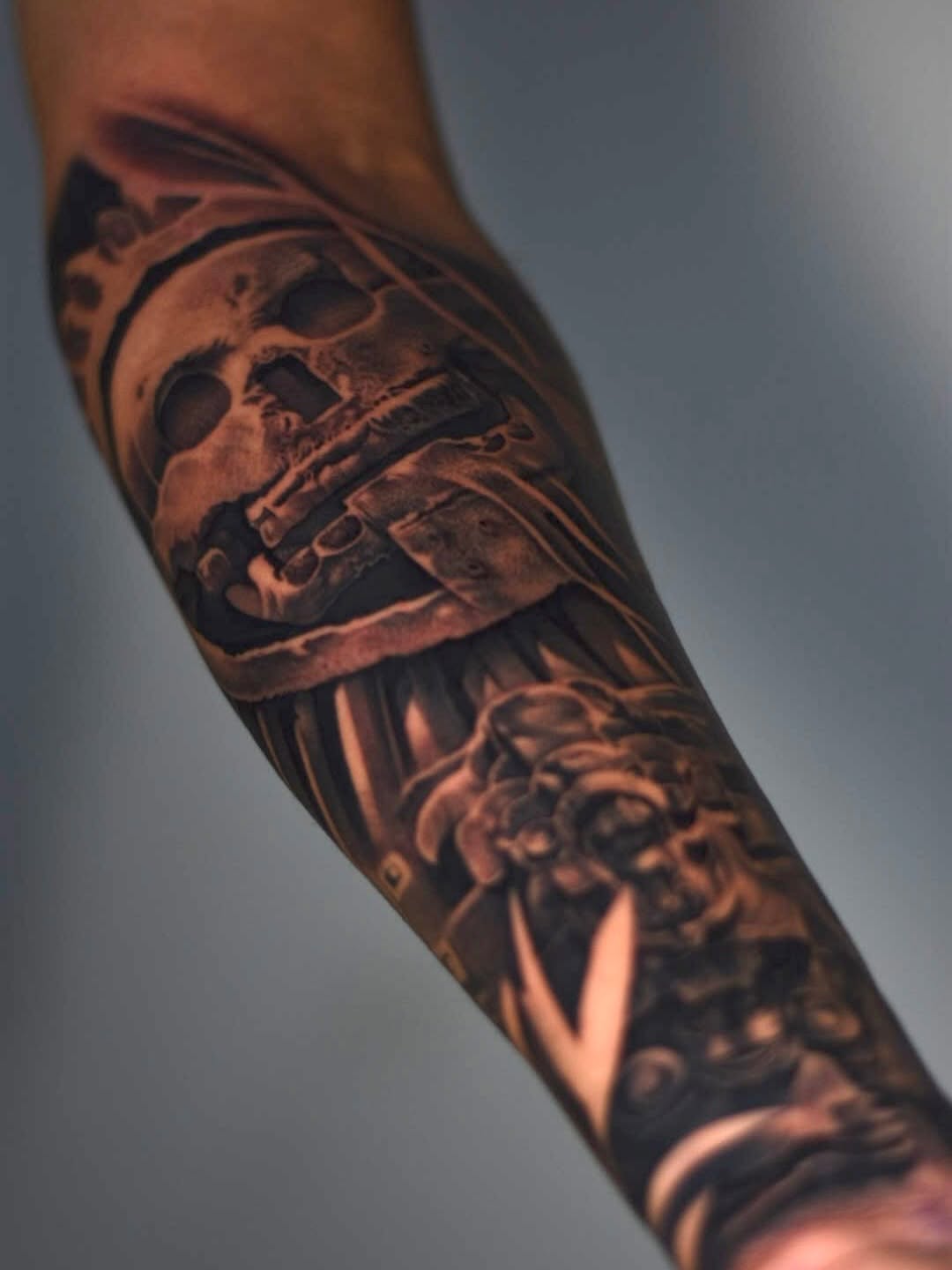 Mictlantecuhtli tattoo design with sword imagery on client by Broadway Dept. Sacramento