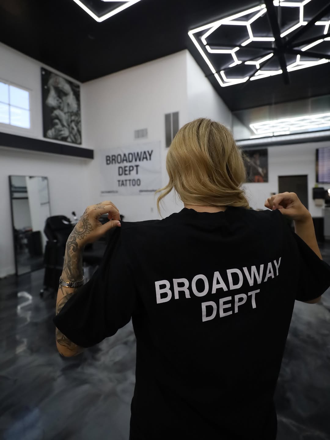 Isabella BG with client during tattoo session at Broadway Dept. on 21st Street Sacramento