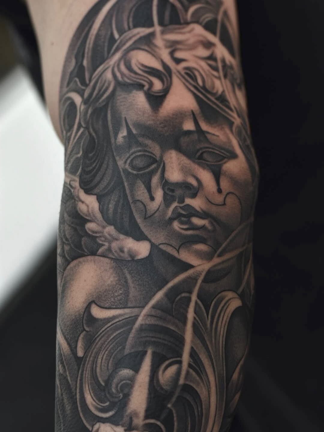 Guardian energy tattoo detail showcasing intricate line work at Broadway Dept.