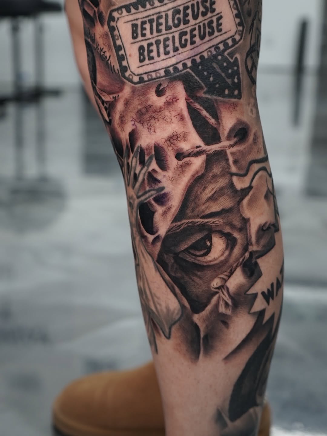 Close-up of Jeepers Creepers character tattoo with detailed realism shading by Charleigh Rae