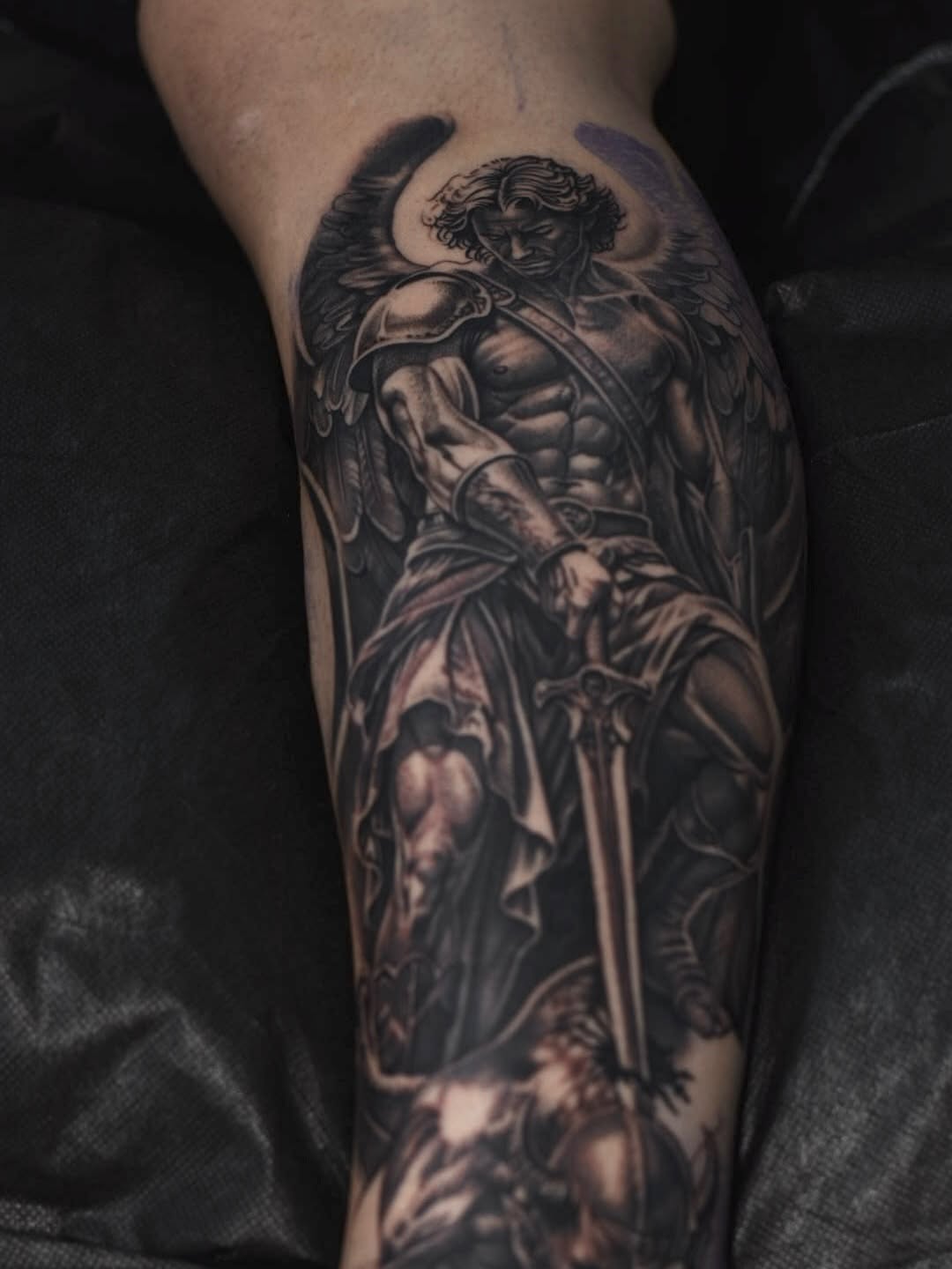 Artist working on multi-session tattoo piece at Broadway Dept Midtown Sacramento
