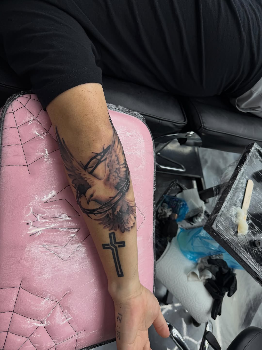 Completed dove tattoo by David Maciel showing clean linework at Broadway Dept