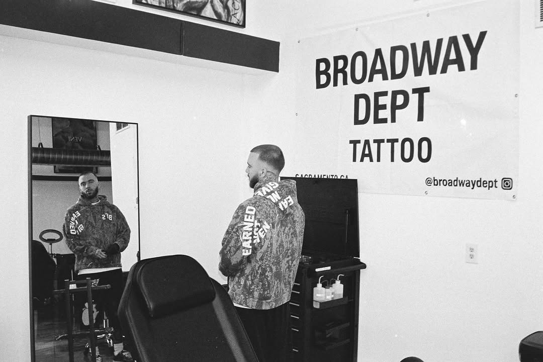 Display of tattoo artwork and portfolio pieces at Broadway Dept. Midtown Sacramento.