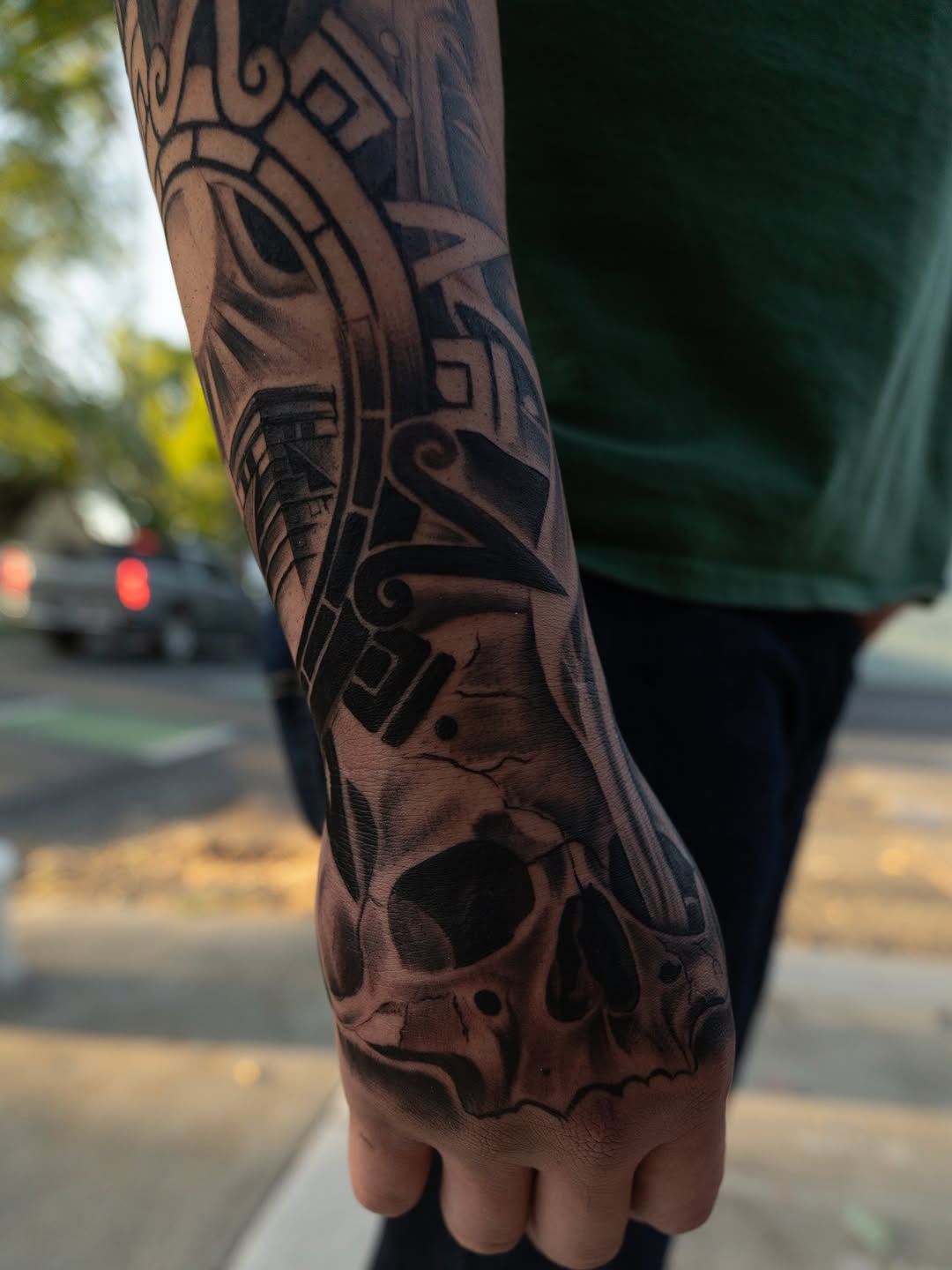First tattoo session in progress at Broadway Dept. Midtown Sacramento, showing client trust and professional artistry.