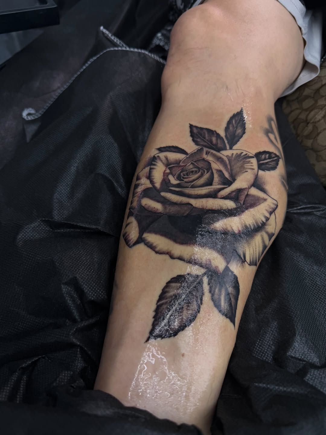 Finished rose tattoo design on client at Broadway Dept. Midtown Sacramento