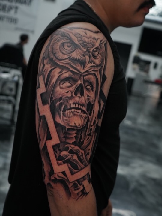 Finished upper arm tattoo by Jesus Bernal at Broadway Dept. in Midtown Sacramento