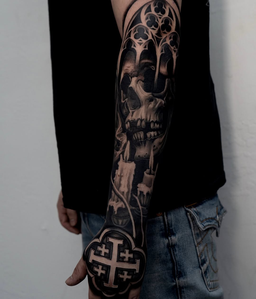 Completed outer forearm and hand tattoo by Bella Gomez at Broadway Dept. Sacramento, showing full two-session design