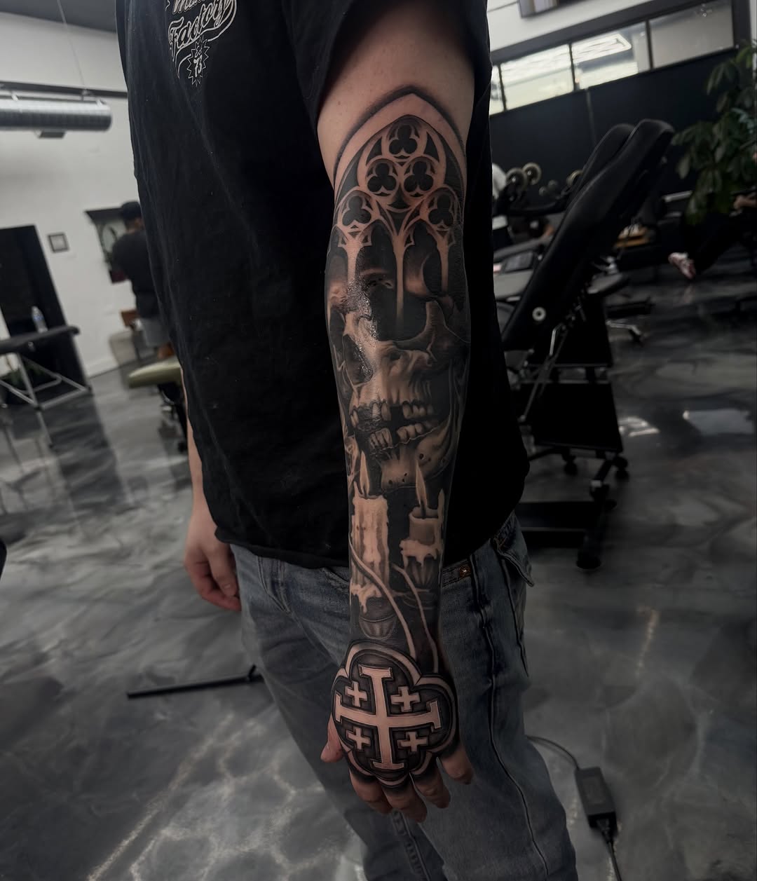 Detailed view of outer forearm and hand tattoo design by Bella Gomez at Broadway Dept. Midtown Sacramento