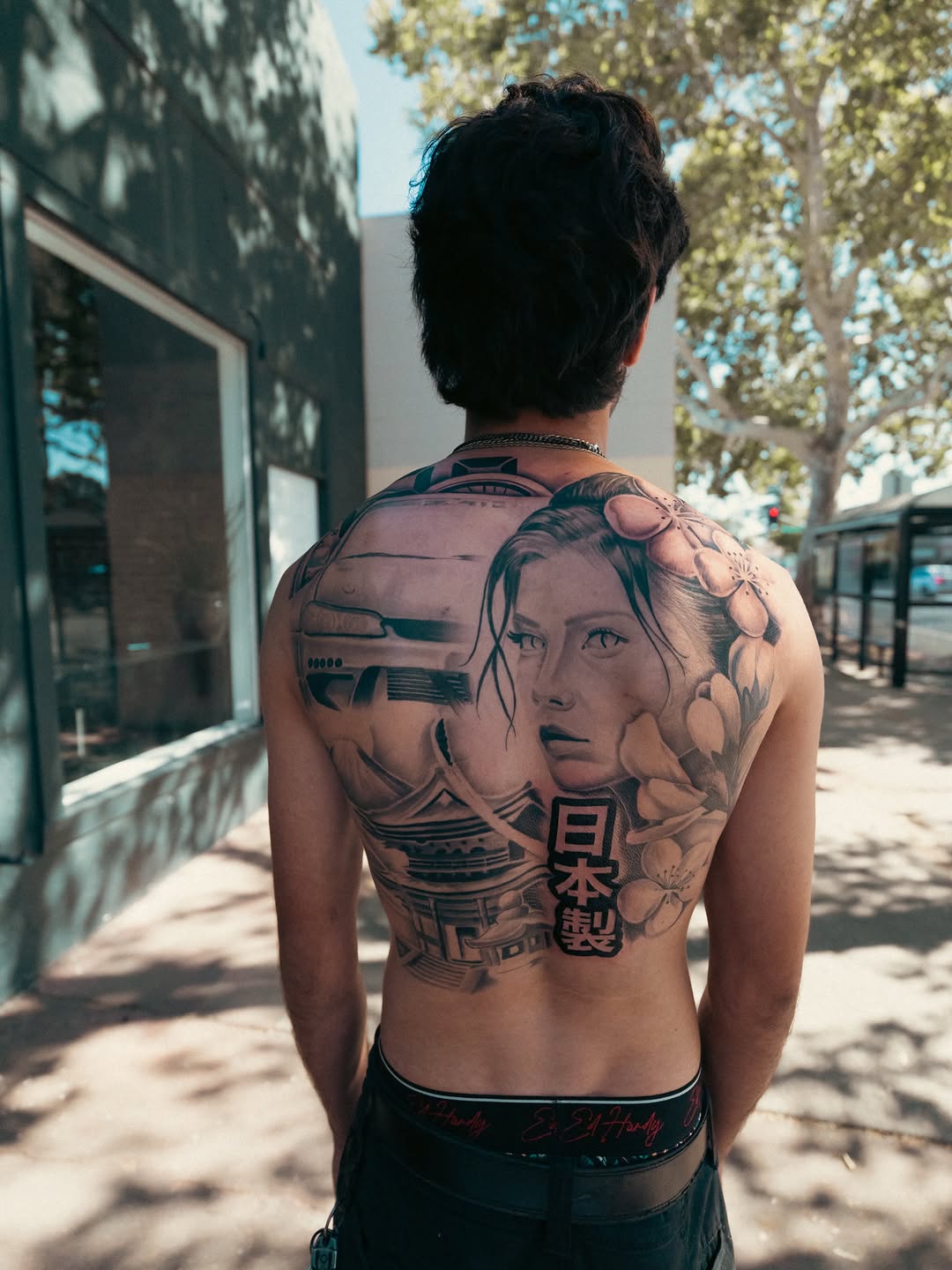 Tattoo artist Jesus Bernal working on collaborative session at Broadway Dept. Midtown