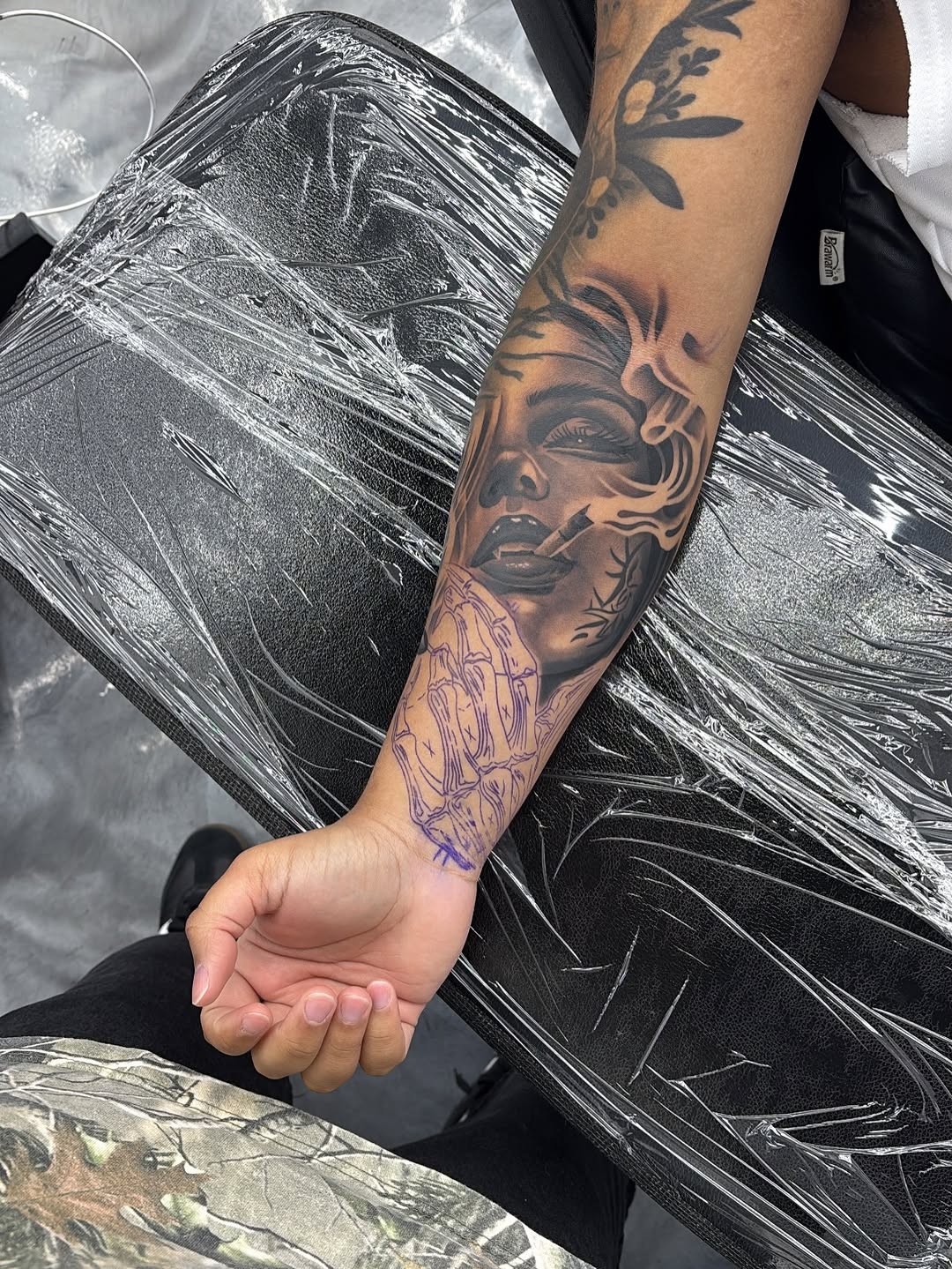 Close-up detail of custom tattoo artwork by Broadway Dept artist