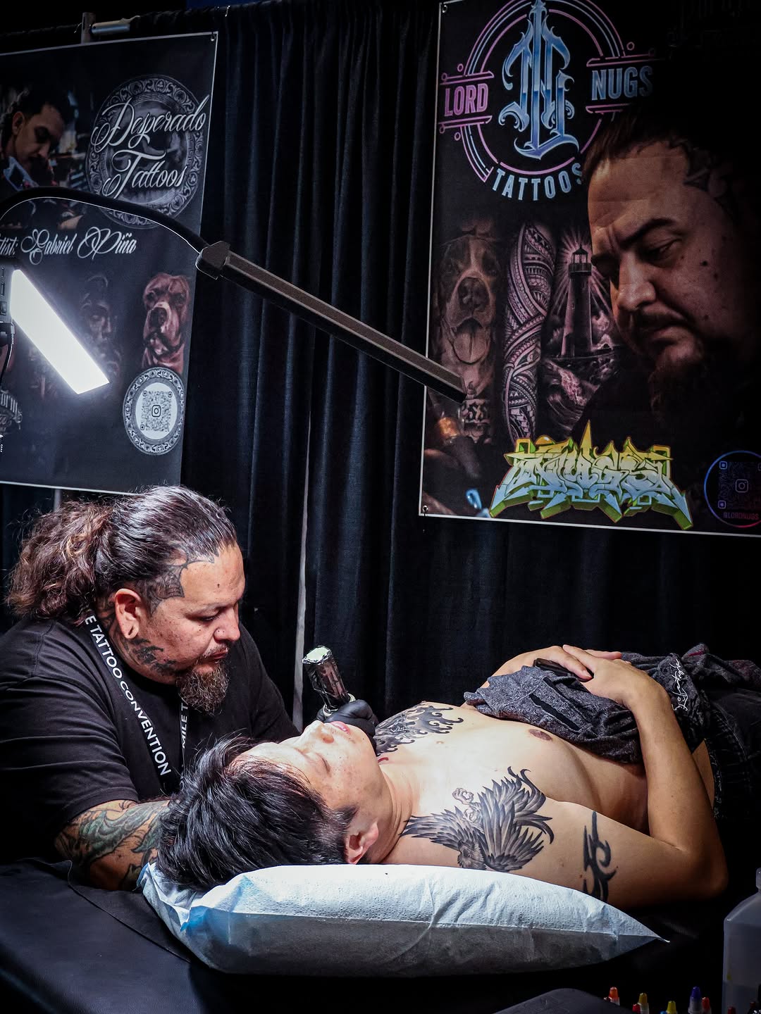 Intricate tattoo artwork displayed at Forty Mile Tattoo Convention Sacramento.