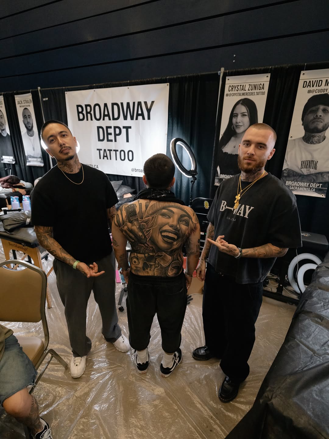 Tattoo artists and clients at Forty Mile Tattoo Convention showcasing Sacramento talent