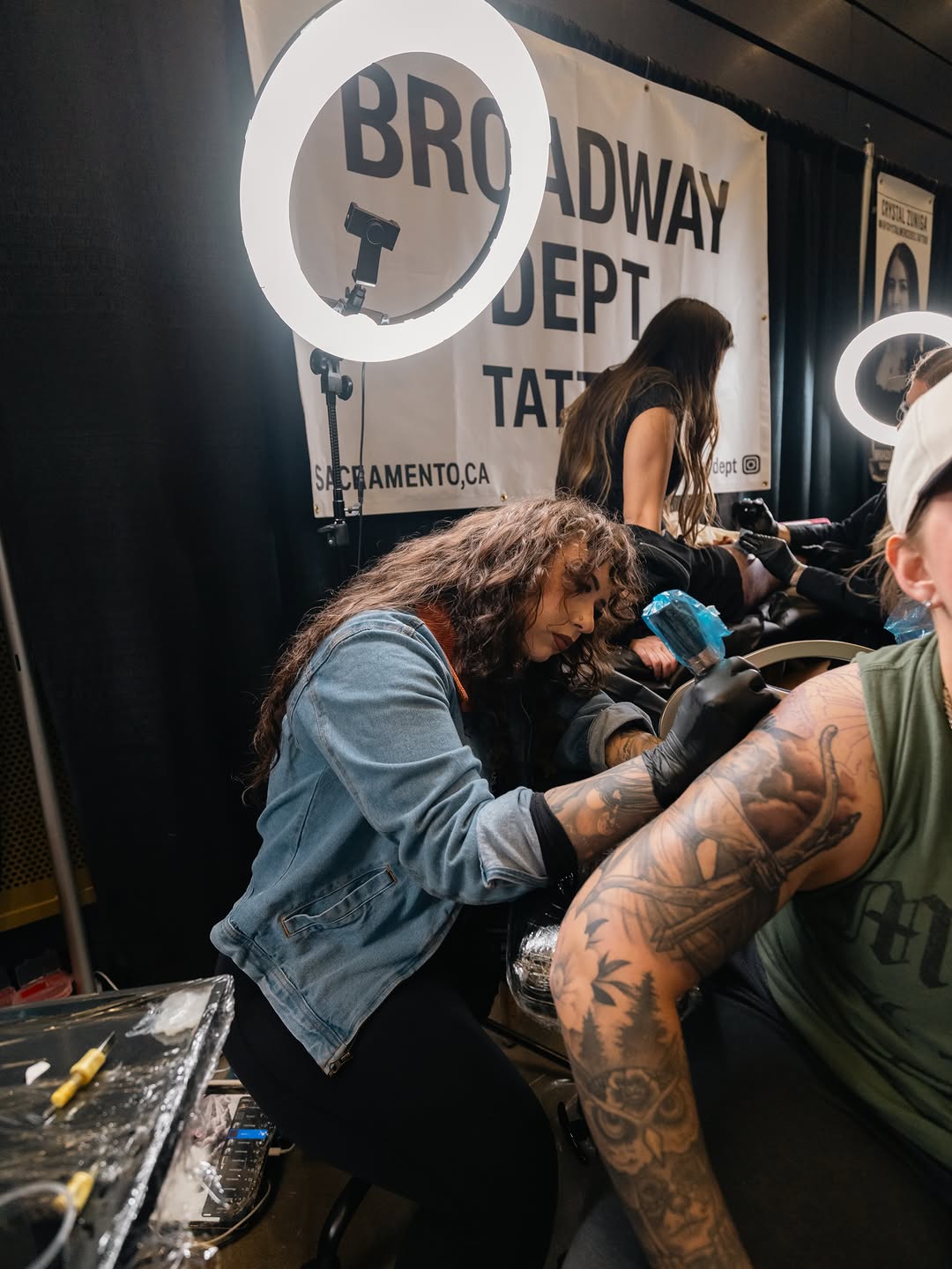 Tattoo convention attendees and Broadway Dept team interaction