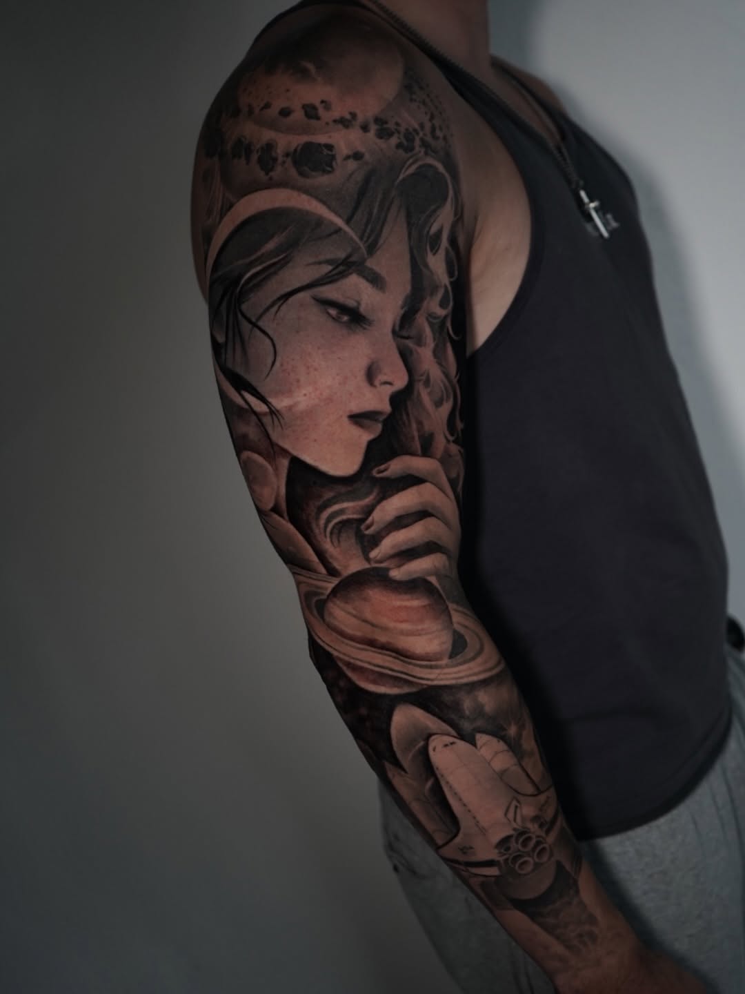 Finished space themed sleeve tattoo showcasing detailed cosmic artwork by Broadway Dept artist