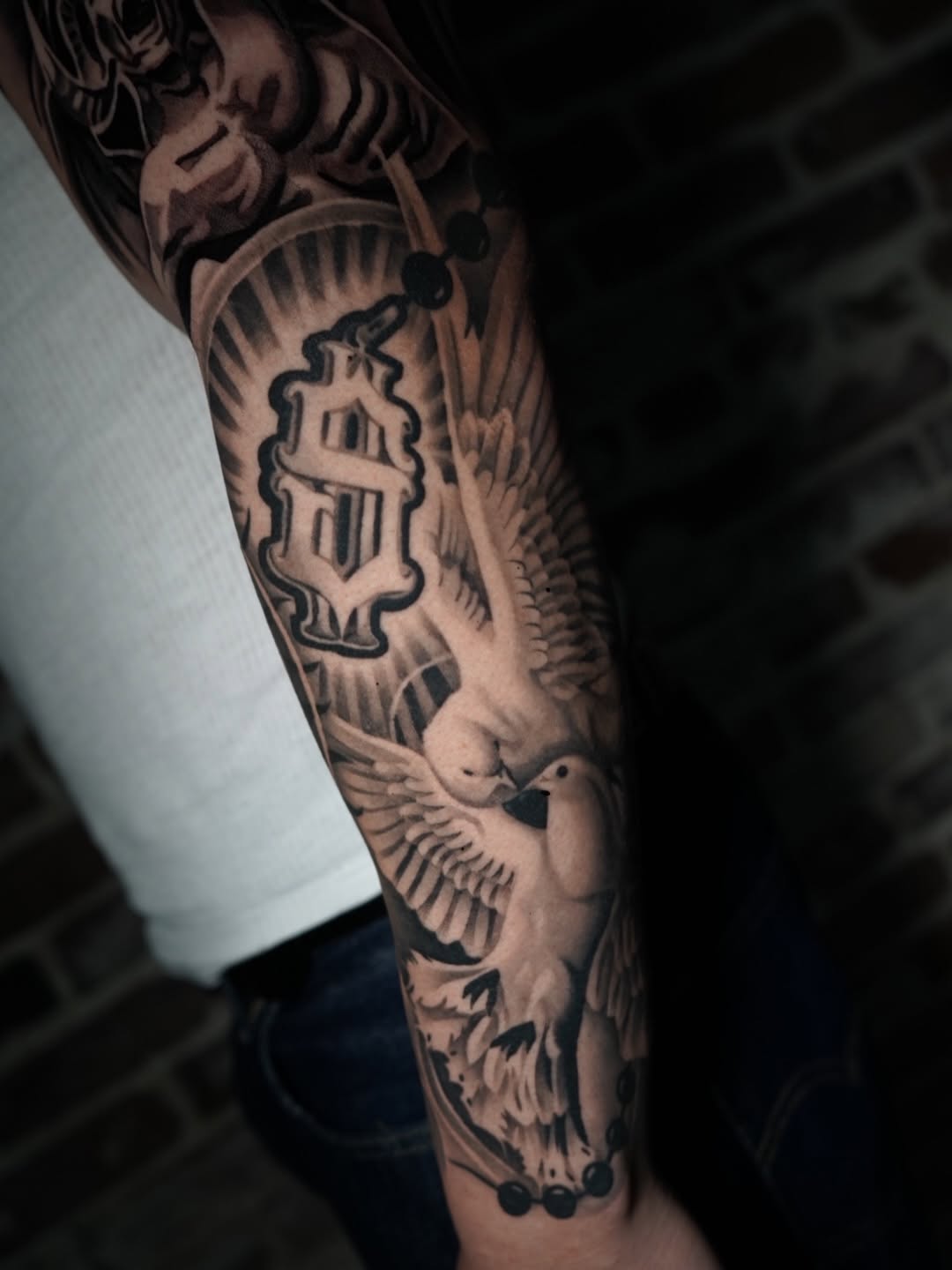 Large scale black and grey tattoo by Jack Stralen Broadway Dept