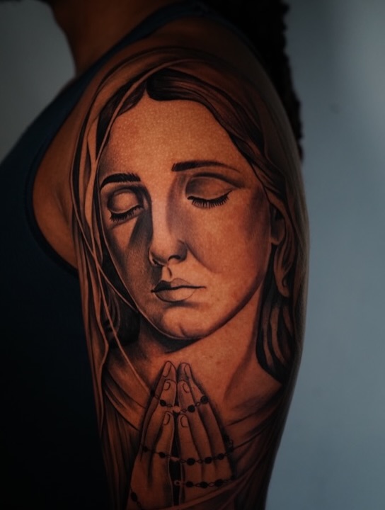 Close-up of fresh tattoo design by Jesus Bernal