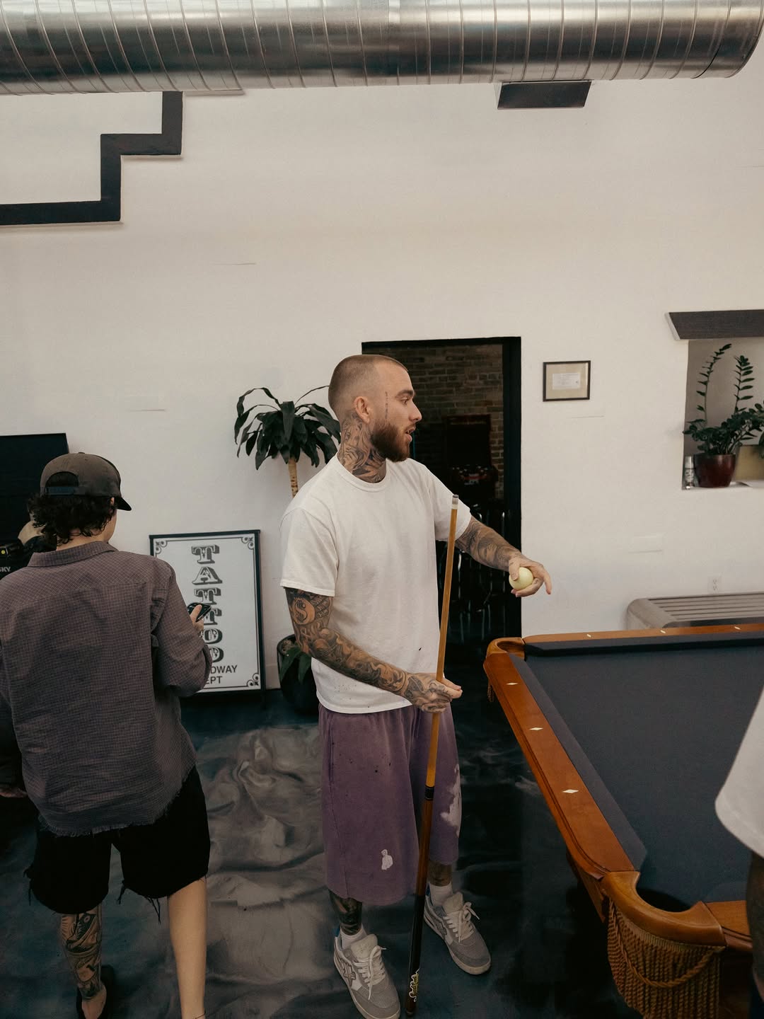 Tattoo artist at work during Saturday session at Broadway Dept Sacramento